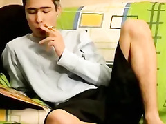 Chain smoking twink strokes his hard rod