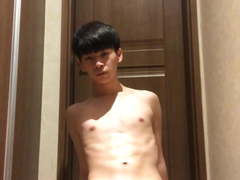 Asian teen shows his shaved cock and anal