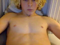 Curly haired teen jerking off and cumming